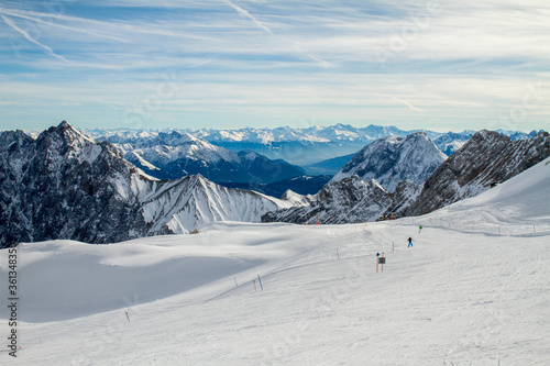 ski slope and panorama of the snowy alps from the ski resort © Lahodyuk