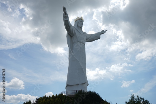 The statue of Jesus Christ with beatiful background, blue sky white clouds