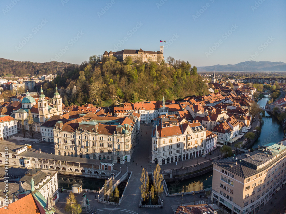 Aerial drone panoramic view of Ljubljana, capital of Slovenia in warm afternoon sun.