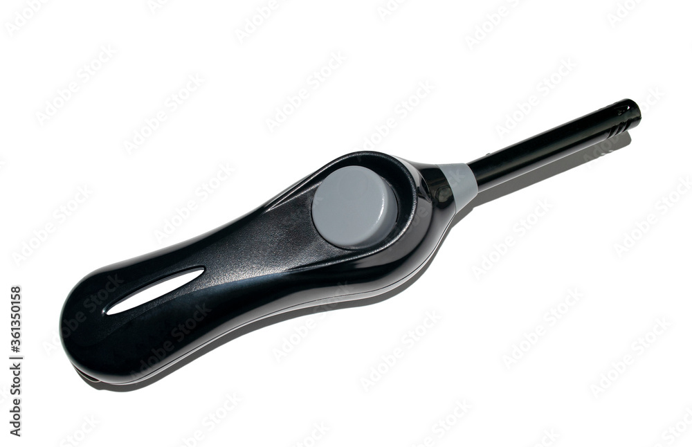 Gas lighter gun for gas-stove or bbq isolated on white background. Top view. Black multi-purpose lighter. Kitchen lighter. Gas lighter gun for gas-stove or bbq isolated on white background. Top view. Black multi-purpose lighter. Kitchen lighter.