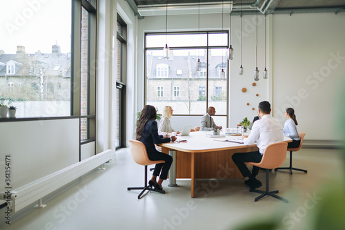 Diverse businesspeople having a meeting together in an office bo