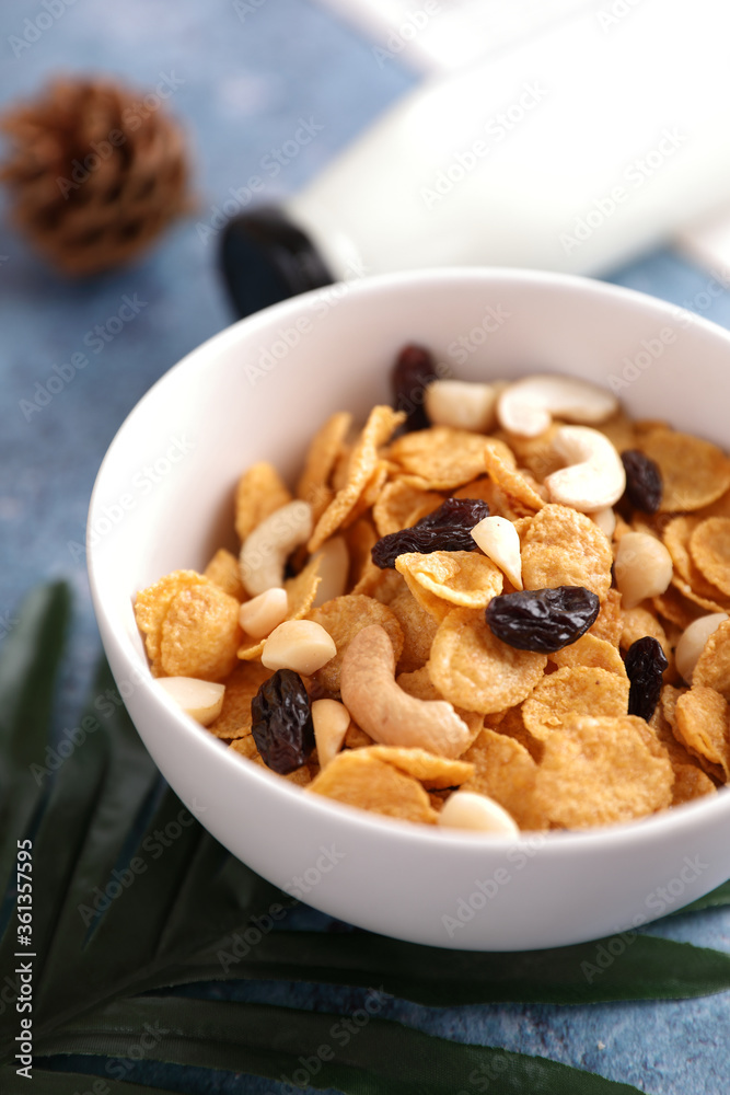 Cereal dessert with corn oat and dry fruits isolated in blue background Cereal dessert with corn oat and dry fruits isolated in blue background