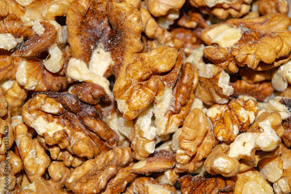 Peeled walnuts close-up. Surface texture. Healthy diet. Peeled walnuts close-up. Surface texture. Healthy diet.