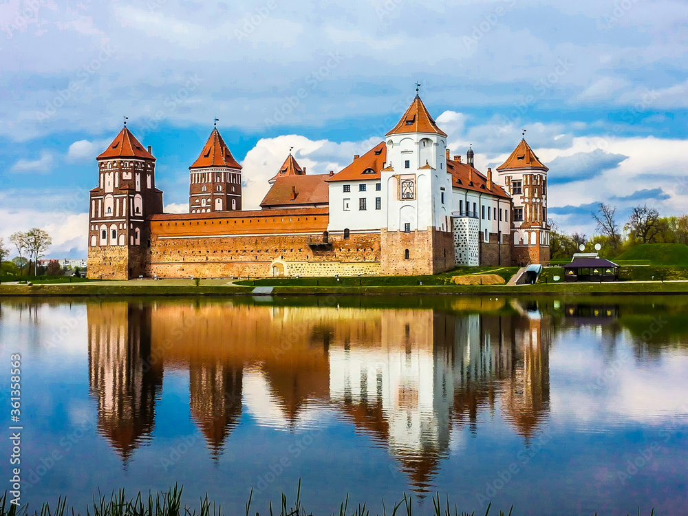 amazing Mir Castle reflected in the lake, Belarus