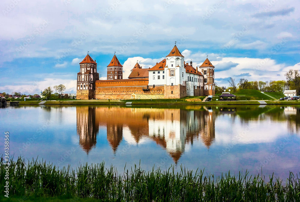 amazing Mir Castle reflected in the lake, Belarus