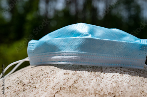 Used Corona Virus mask outdoors