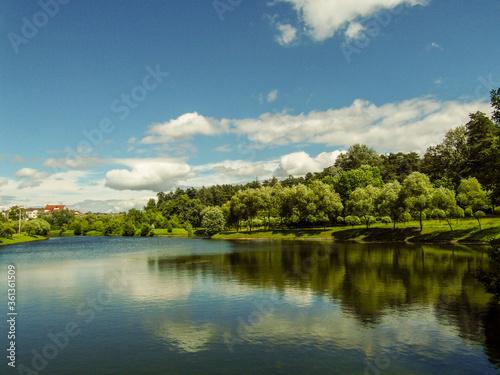 Fototapeta Naklejka Na Ścianę i Meble -  Beautiful natural landscape near a reservoir on a Sunny summer day