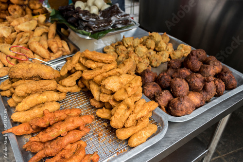 Indian breakfast traditional samosa dosa vadai brown balls deep fried. photo