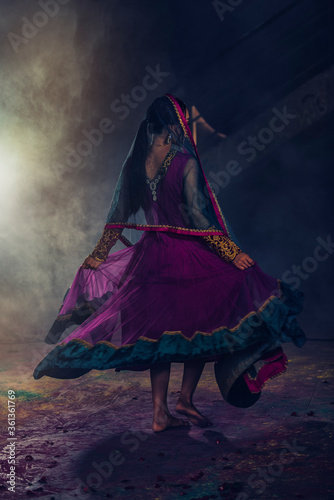 woman dancing in the night