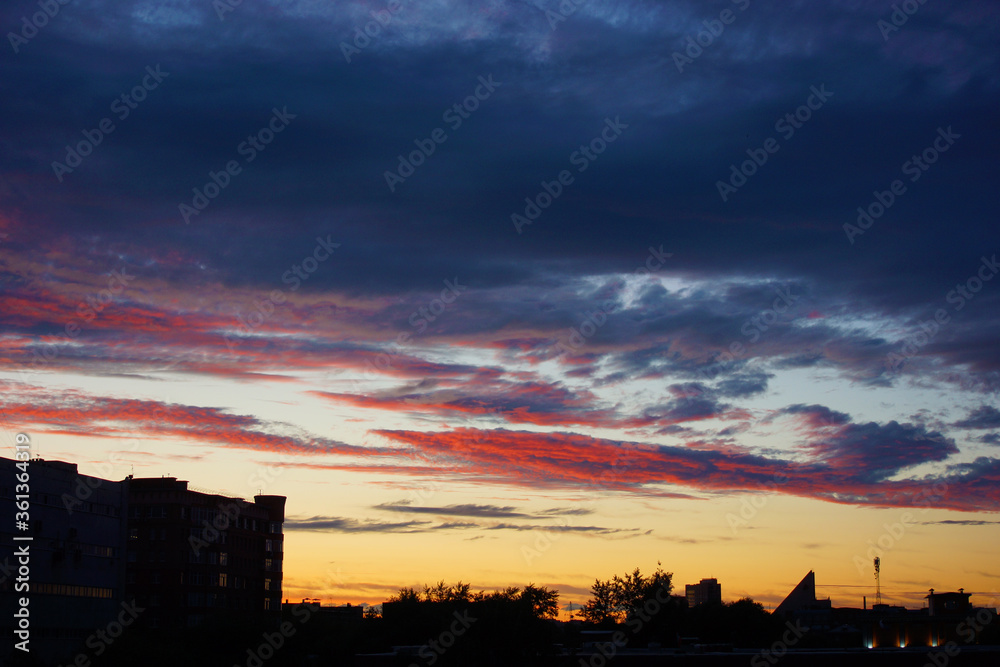 Beautiful full-color sunset over the city.