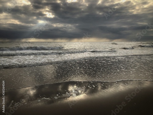 Beach sea coast. Northsea coast Netherlands Juilanadorp. Noord Holland. Sunset photo