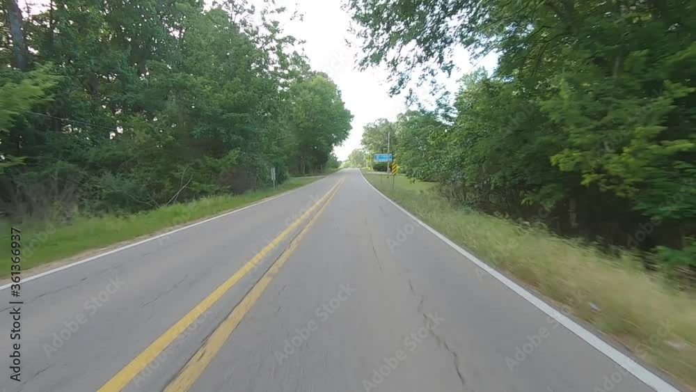 POV driving on a rural highway from Alabama into Mississippi POV driving on a rural highway from Alabama into Mississippi
