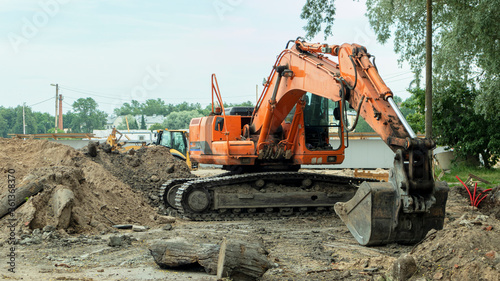 construction excavator near the construction site