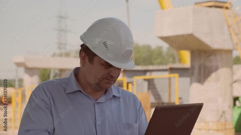 Dissatisfied inspector inspects the construction site. supervisor identifies violations and problems during construction work.