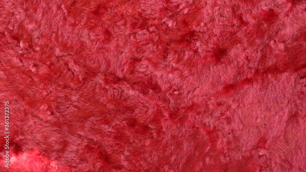 bright saturated pink background of artificial short fur with crumpled pile bright saturated pink background of artificial short fur with crumpled pile