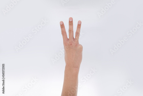 Number three index finger on white background