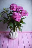 bouquet of lilac flowers on a wooden table