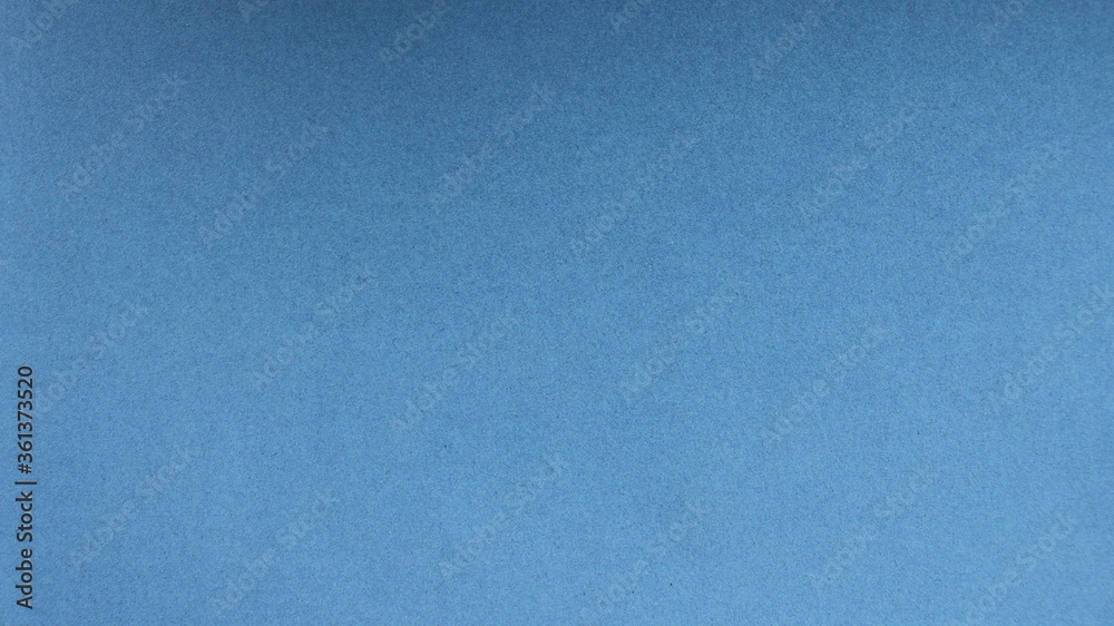 plain blue background with a light grainy dotted structure and a flat surface as the basis for design and creativity plain blue background with a light grainy dotted structure and a flat surface as the basis for design and creativity
