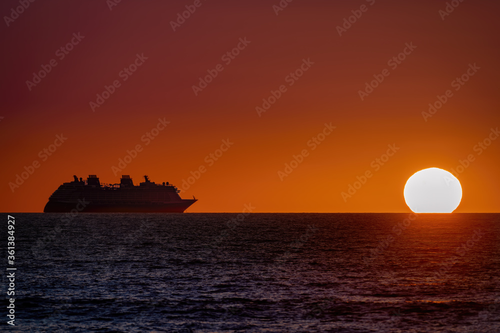 Cruise ship sunrise over ocean