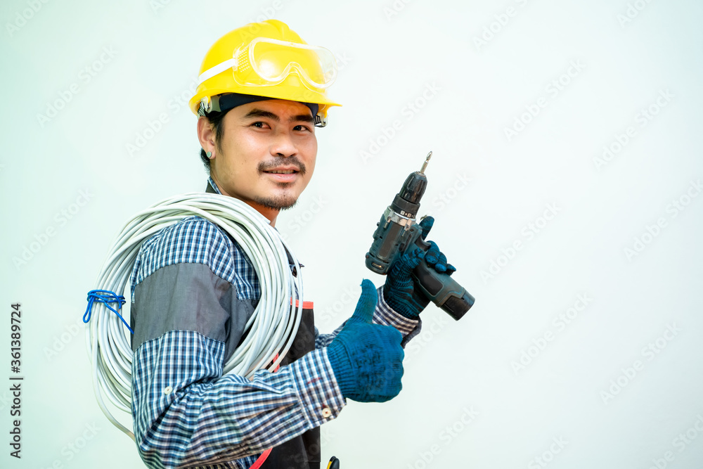 Portrait of electrician in hard hat on white studio background. Portrait of electrician in hard hat on white studio background.