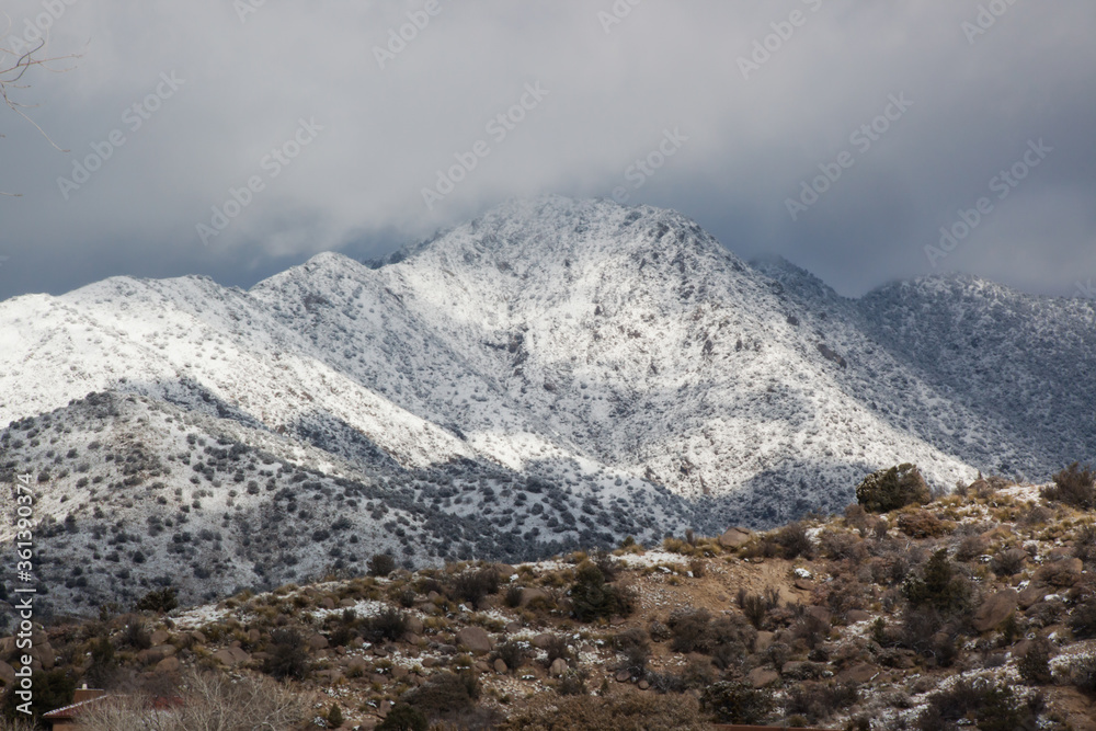 Mountain with snow and clouds