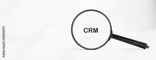 CRM banner, customer relationship management, magnifying glass, success in business concept