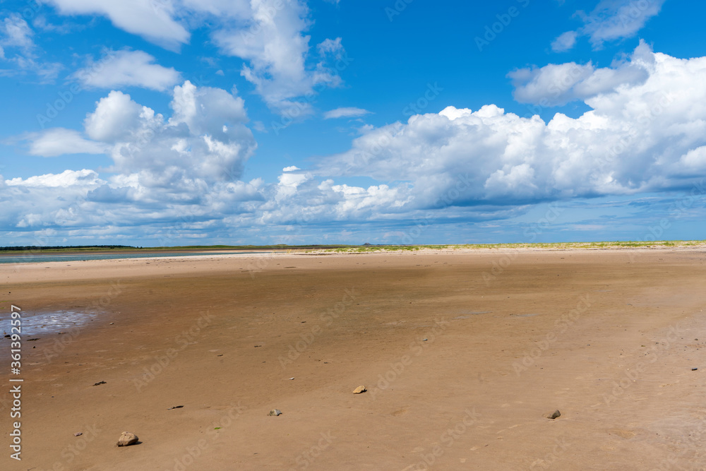 A view of the sands across Budle Bay towards Lindisfarne in Northumberland