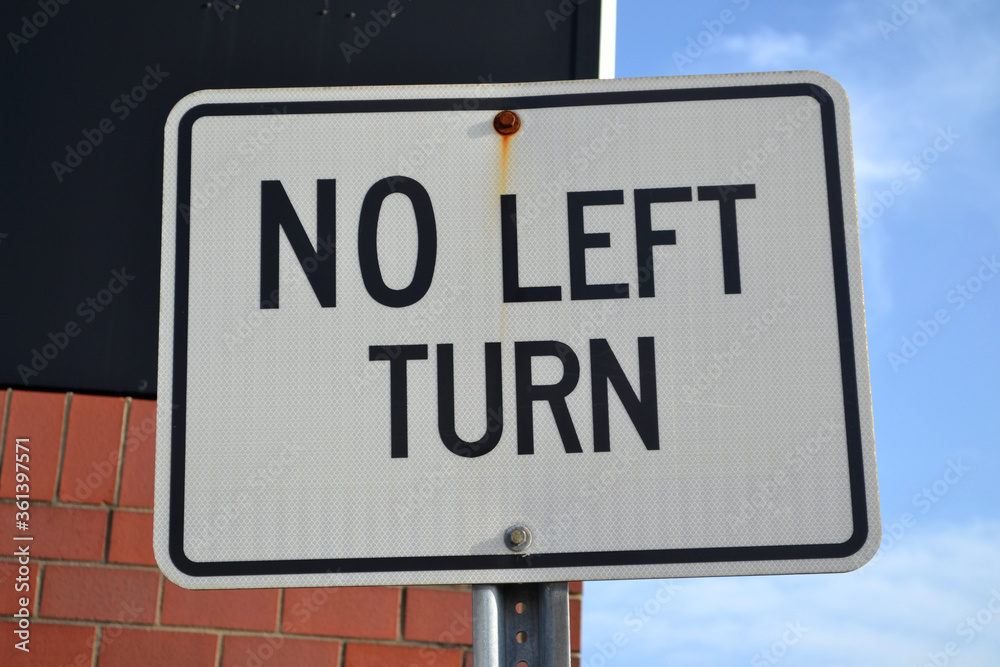 No Left Turn White Signage