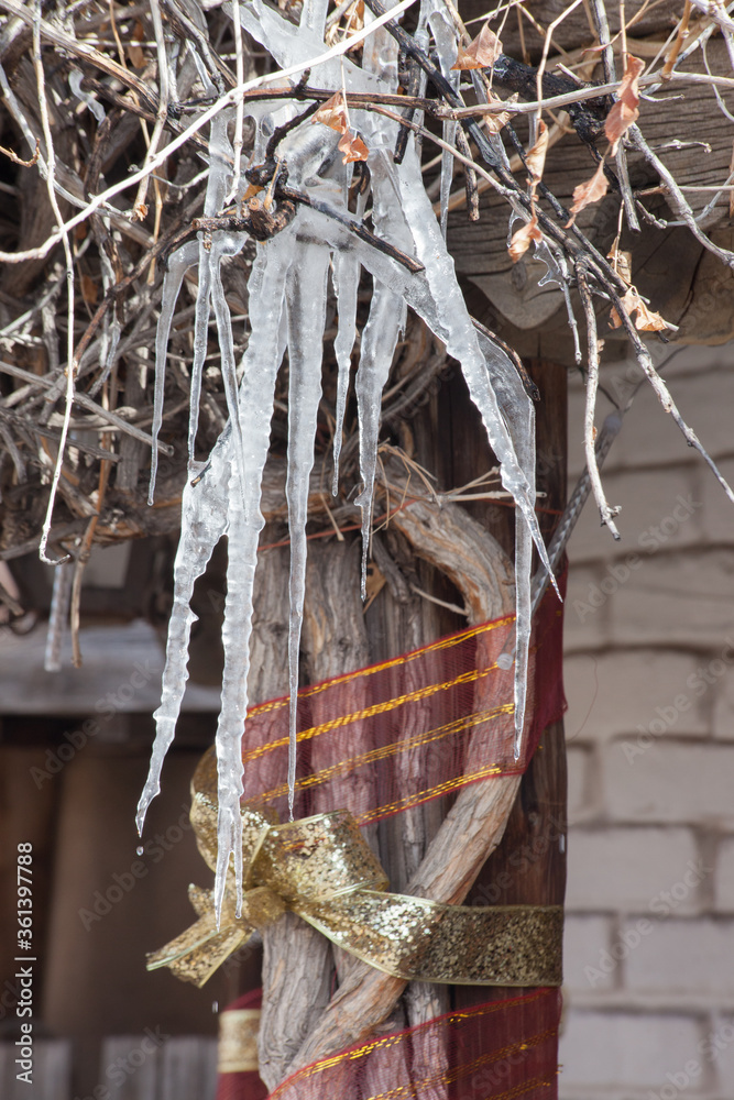 Icicle outdoors and dripping Icicle outdoors and dripping