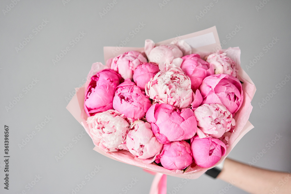 Beautiful bouquet of mixed flowers in woman hand. Floral shop concept . Handsome fresh bouquet. Flowers delivery. Beautiful bouquet of mixed flowers in woman hand. Floral shop concept . Handsome fresh bouquet. Flowers delivery.