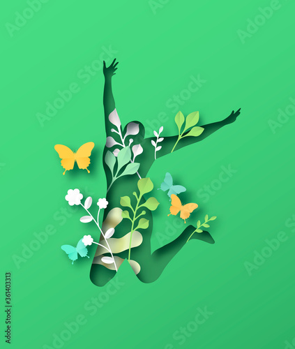 Happy woman jumping with papercut nature