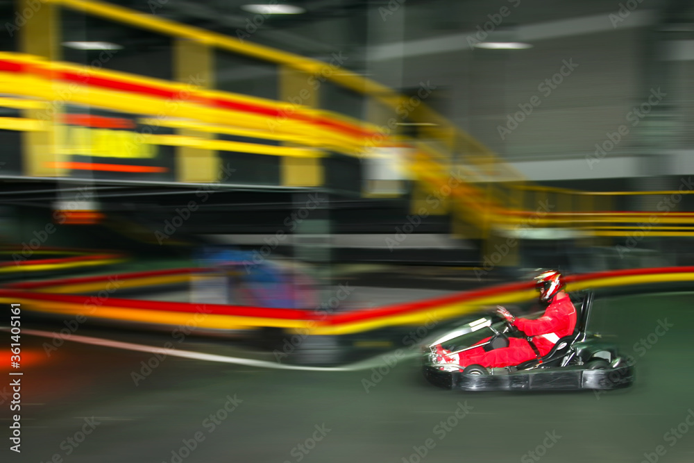 Cards rides at high speed on karting