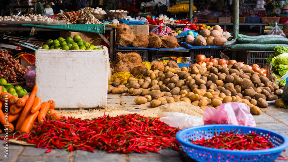 peppers and carrots at a market in Vietnam