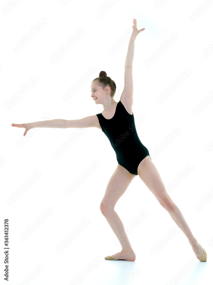 The gymnast prepares to perform the exercise. The gymnast prepares to perform the exercise.