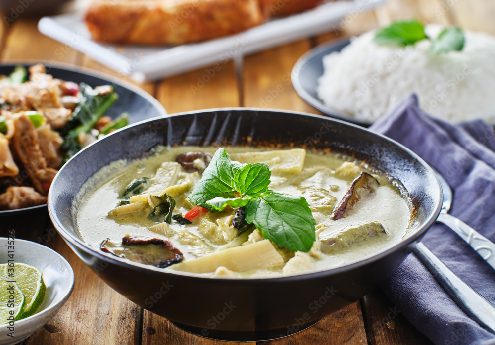 thai green curry with chicken and eggplant in bowl
