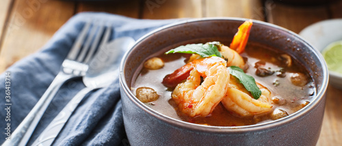 thai tom yum goong soup with shrimp in bowl