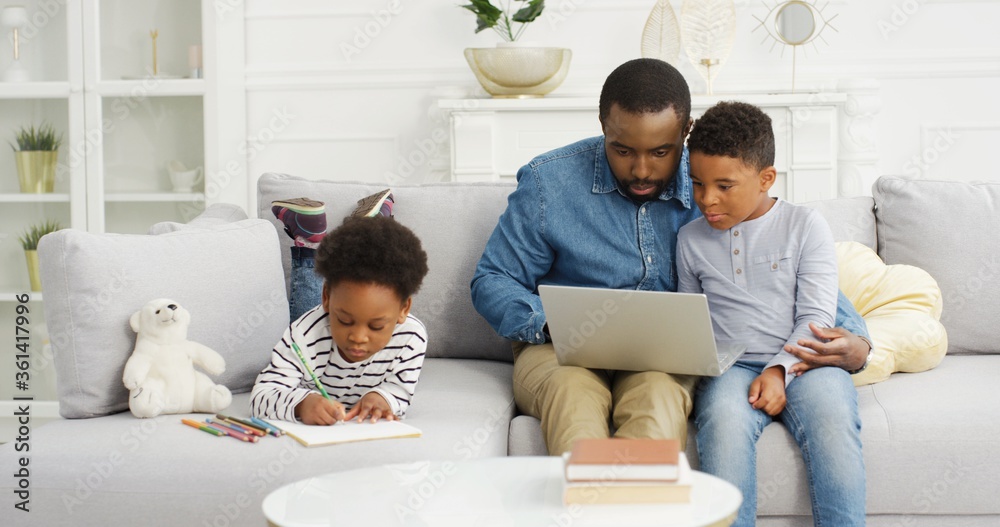 Happy african american family spending time together at home. Happy african american family spending time together at home.
