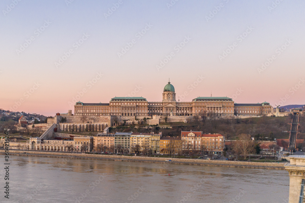 Aerial drone shot of front facade of Buda castle palace complex before Budapest morning sunrise