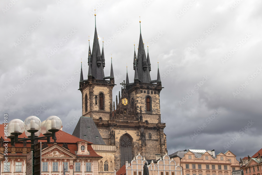 Prague Old Town Church Our Lady of Tyn dark clouds streetlight in foreground nobody