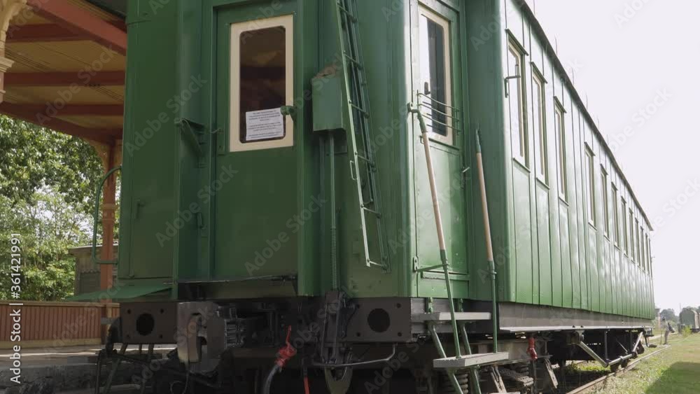 The green train wagon on the tracks in Haapsalu Estonia The green train wagon on the tracks in Haapsalu Estonia