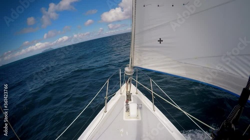 Yacht sailing across ocean / sea boating sea view