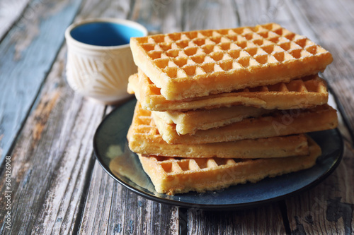 Traditional belgian waffles and coffee cup photo