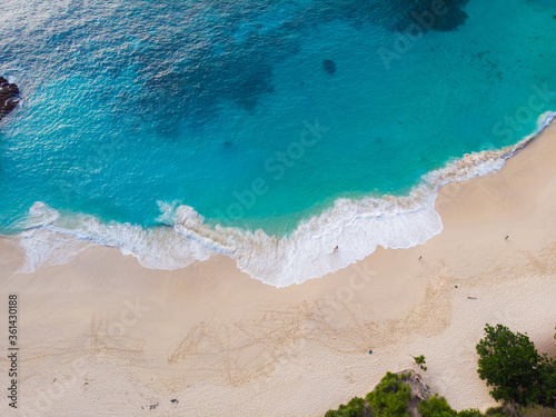 Beautiful viewpoint of Kelingking beach in Nusa Penida island, Bali, Indonesia. Drone view. photo