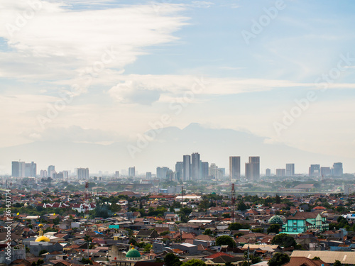 Panorama of the city of Jakarta against the backdrop of the Mountains.