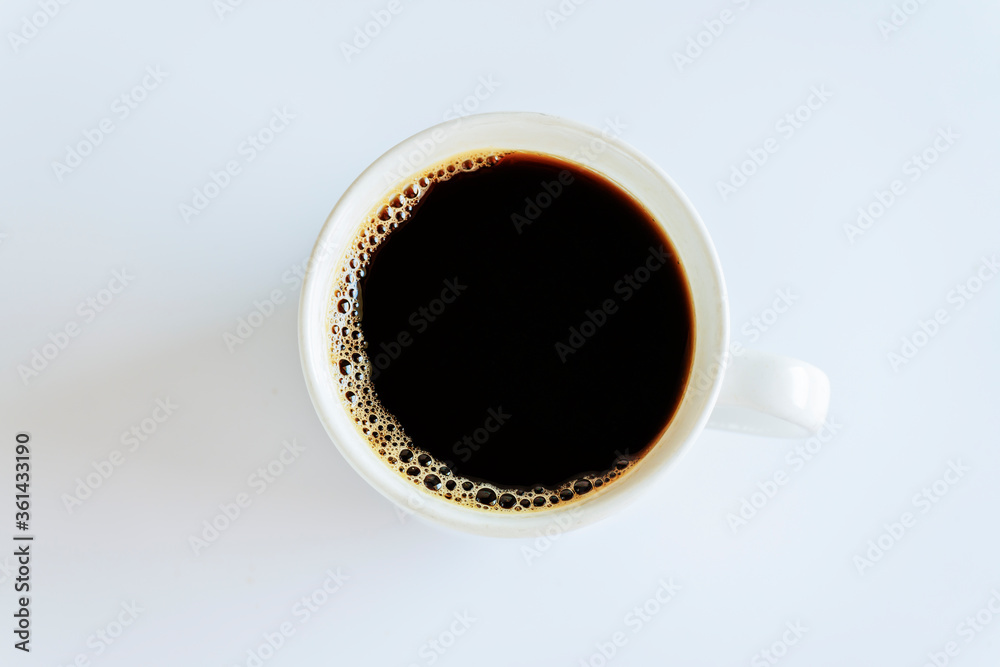 Top view cup of coffee on white background Top view cup of coffee on white background
