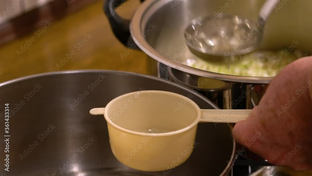 Filtration raw Elder Flower Juice in casserole (Sambucus nigra) - (4K)