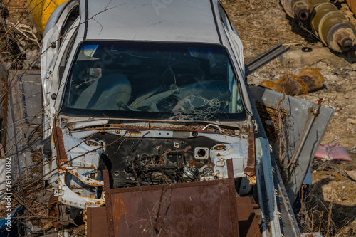 Crashed automobile in junkyard