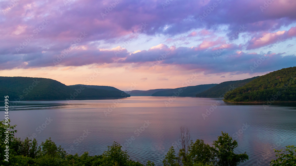 Sunset over the Allegheny reservoir, scenic lake overlook in the Pennsylvania mountains.