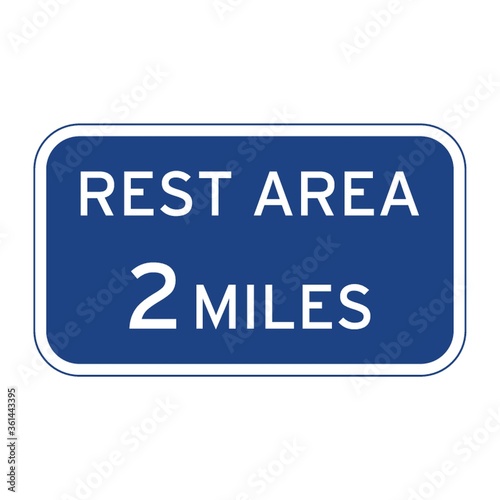 Rest area 2 miles road sign