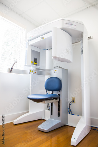Cone Beam CT Scanner machine CBCT 3D xray for face maxilla jaw mandible radiograph three dimensional photo